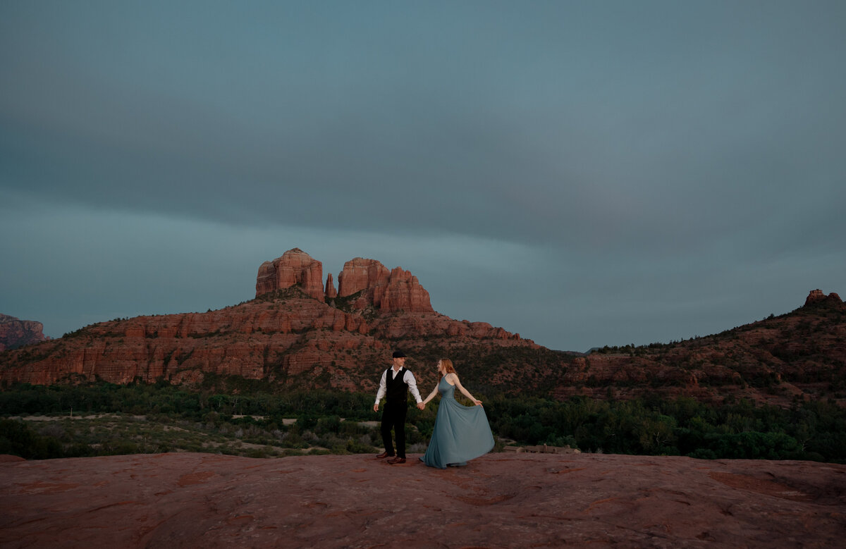 Sunset engagement photo in Sedona with golden Arizona light