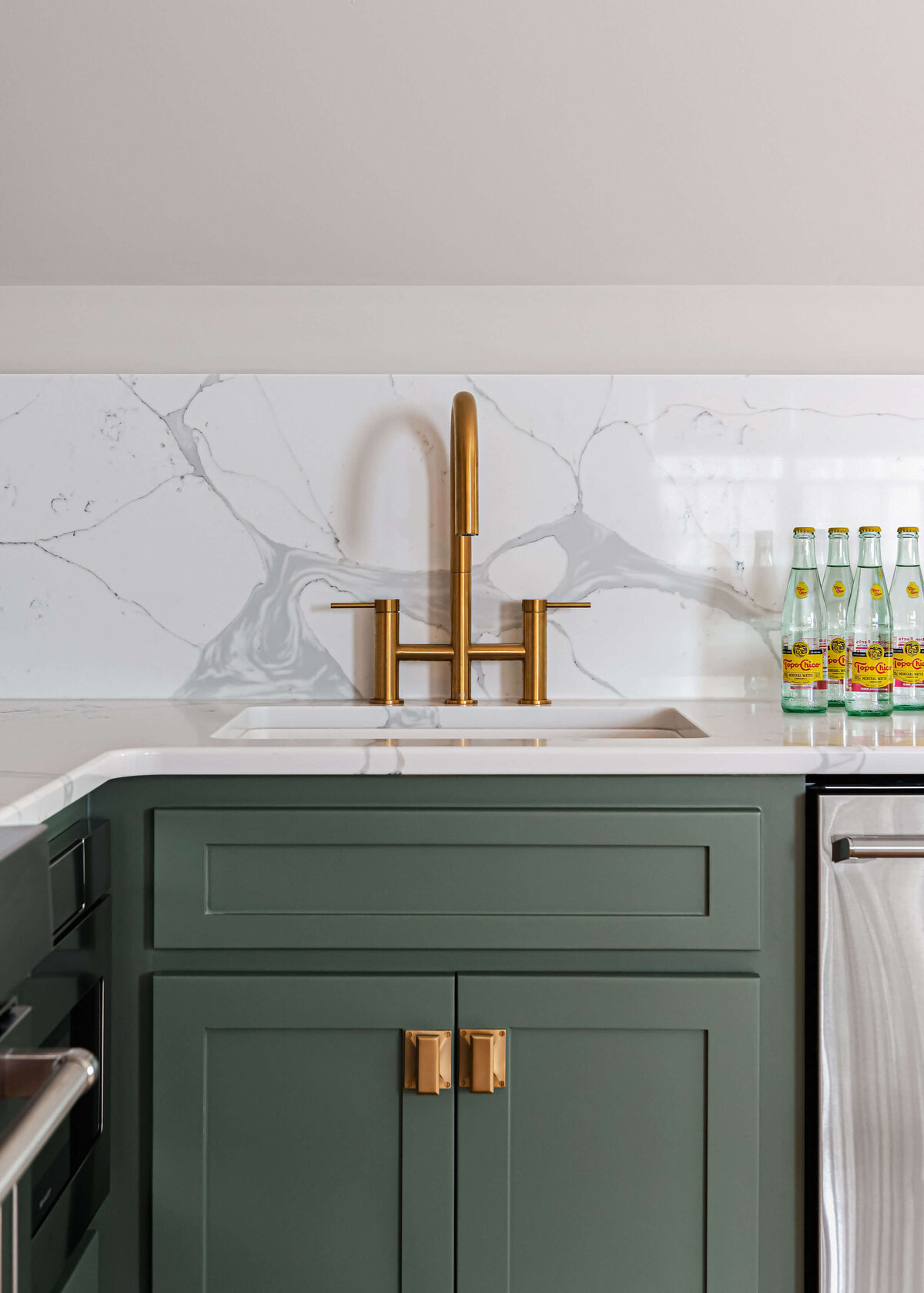 sweet southern home windmill green cabinets and marble walls gold sink