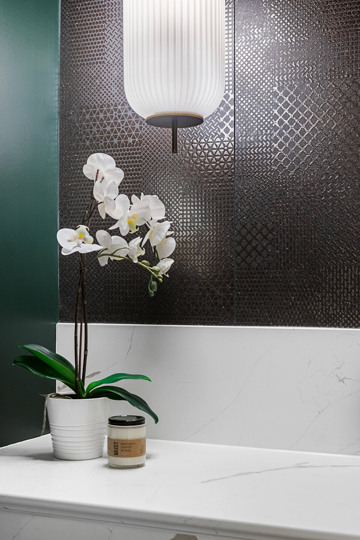 Final image of our moody luxe powder room interior design project.