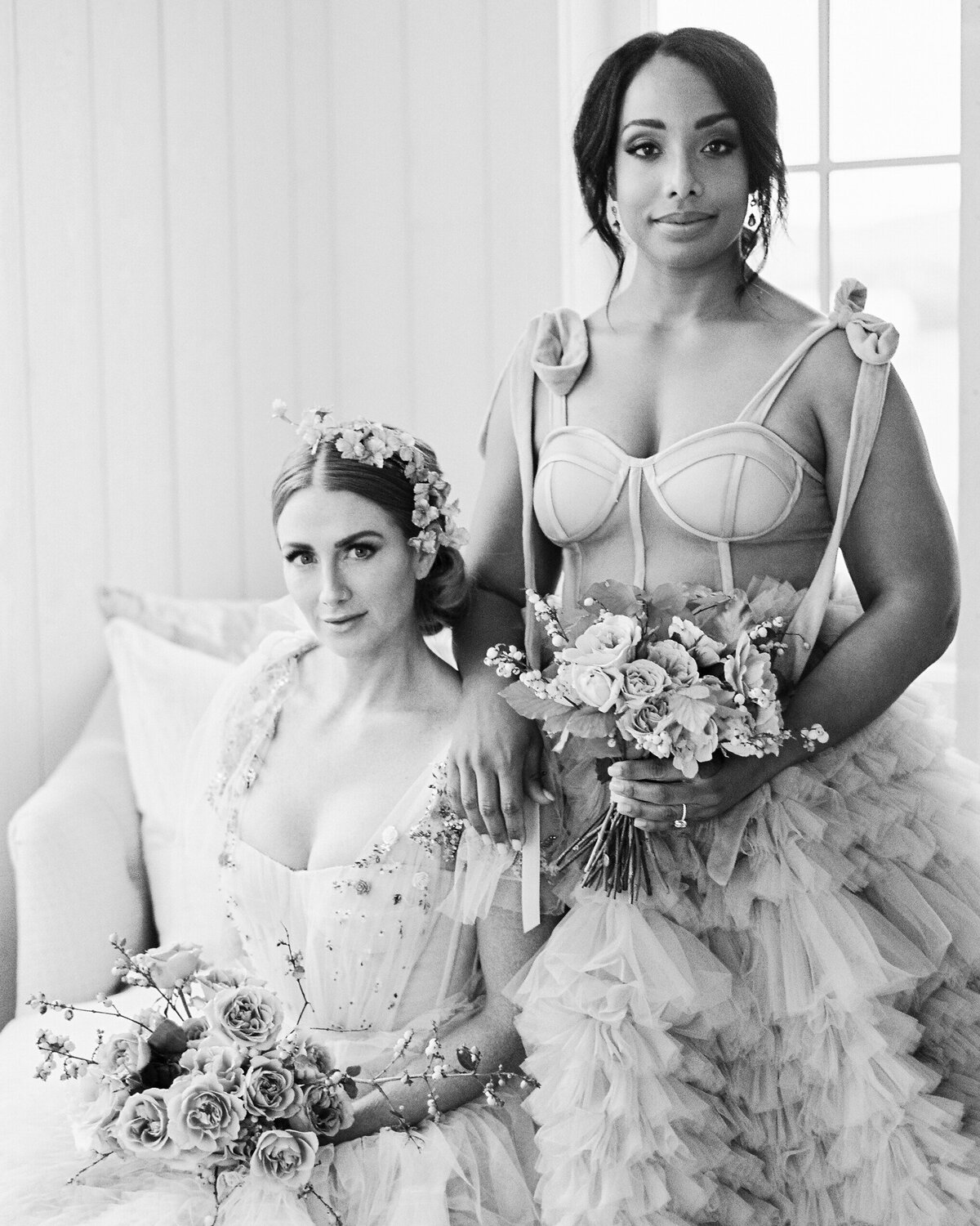 Black and white image of bride and bridemaid
