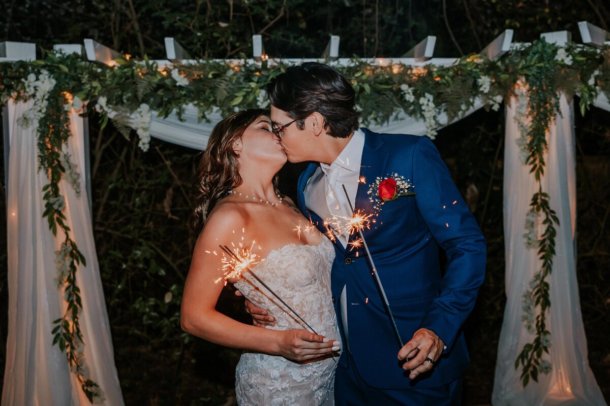 Destination Wedding Photographer captures bride and groom kissing after Hawaii wedding