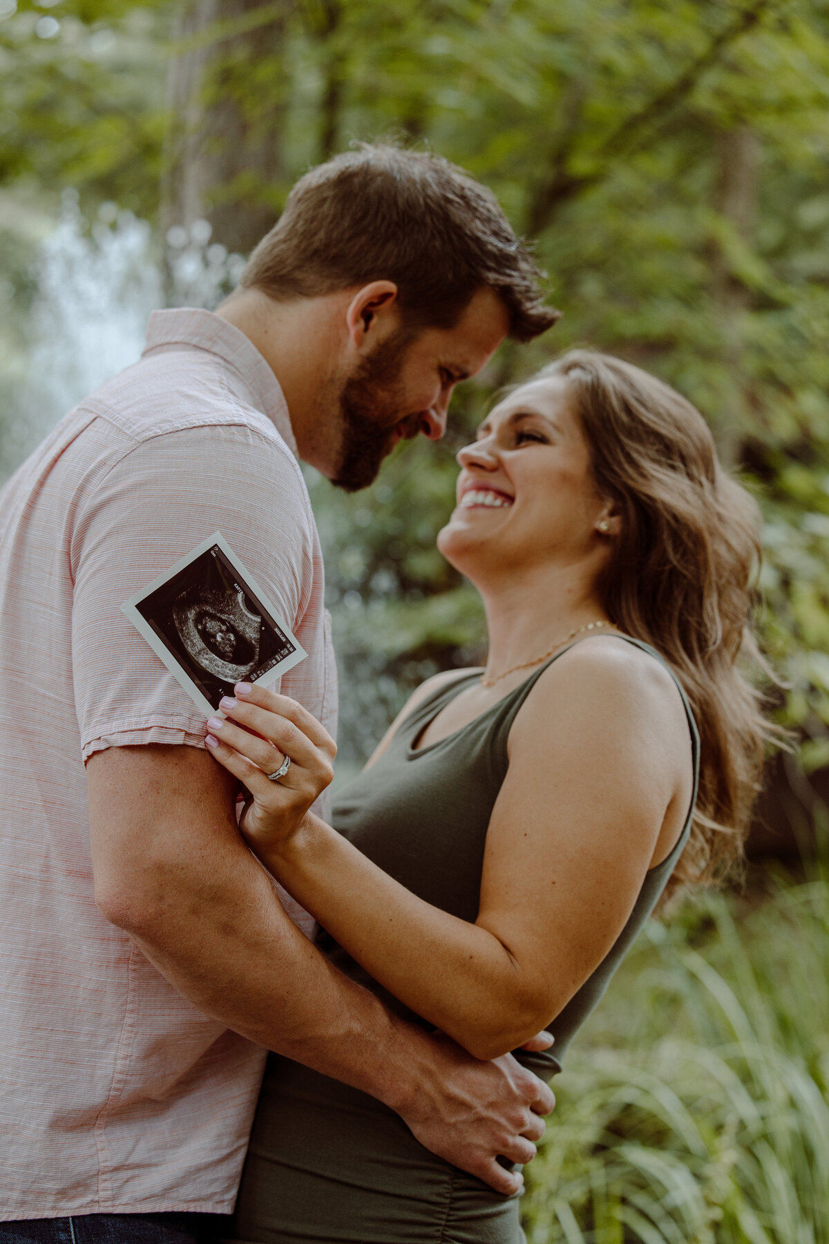 Katie and Owen Anniversary Photos and Baby Reveal at Blue Bridge Traverse City Michigan by Madi Taylor Photo-10