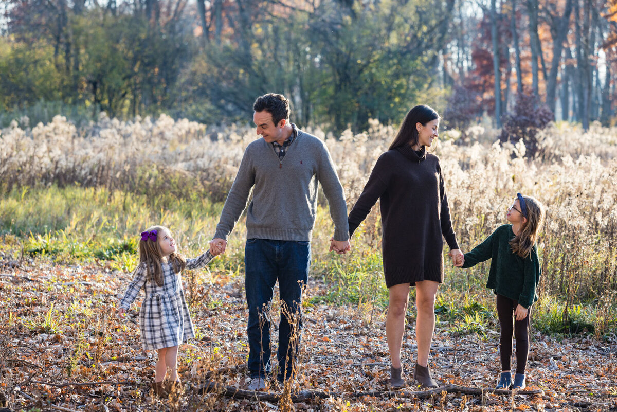 Family portrait in an outdoor forest setting
