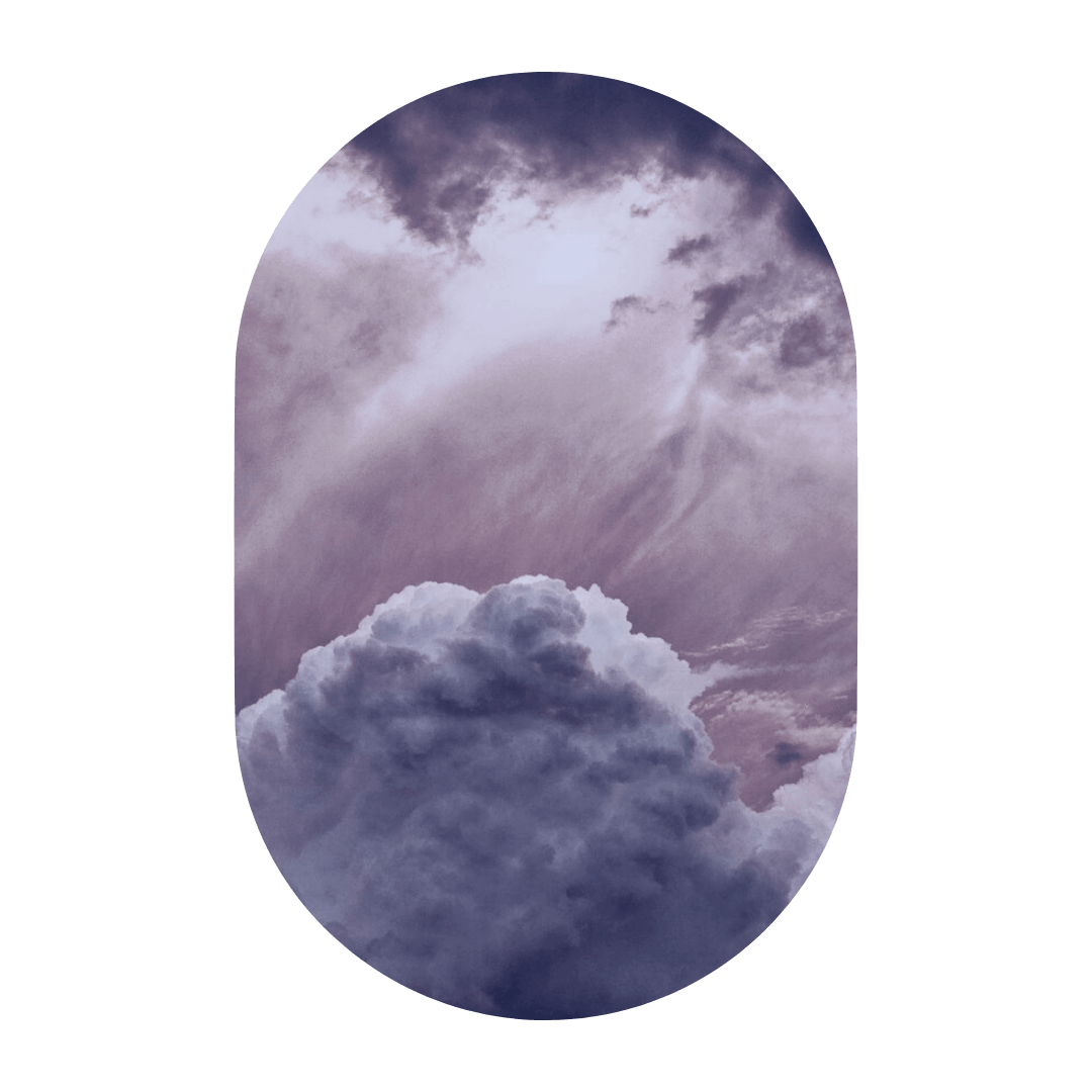 A dramatic view of dark purple clouds in the sky, conveying a sense of atmospheric moodiness.