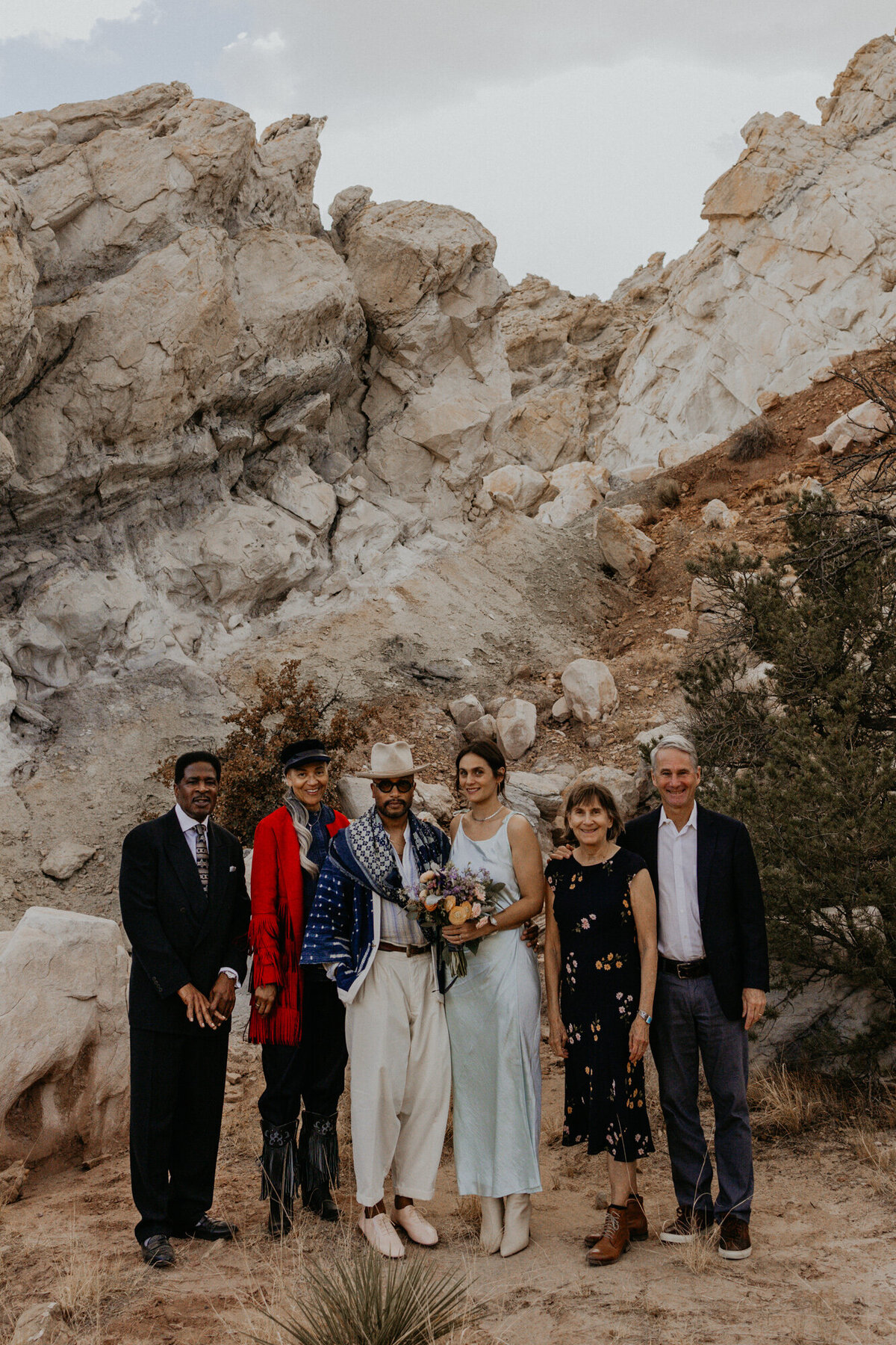 bride and groom with their parents after their elopement ceremony