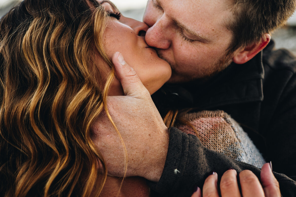 Couple shares a kiss at their Telluride engagement session.