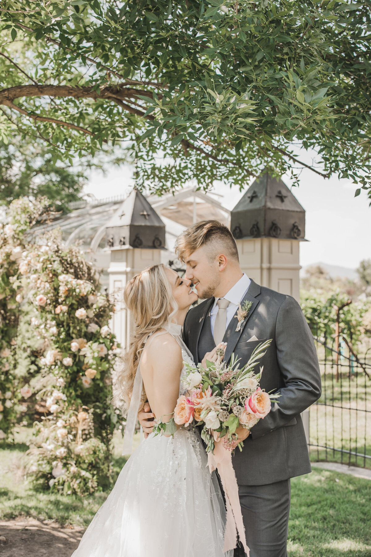Wedding Photographer & Elopement Photographer, couple kissing under tree