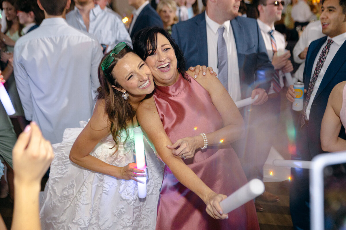 High-energy celebration on the wedding reception dance floor.