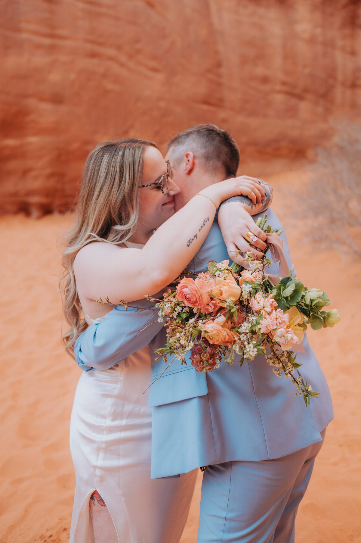 Newlyweds embrace on their elopement day