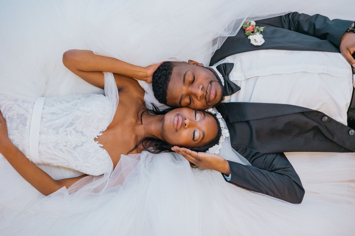 couple laying on the ground
