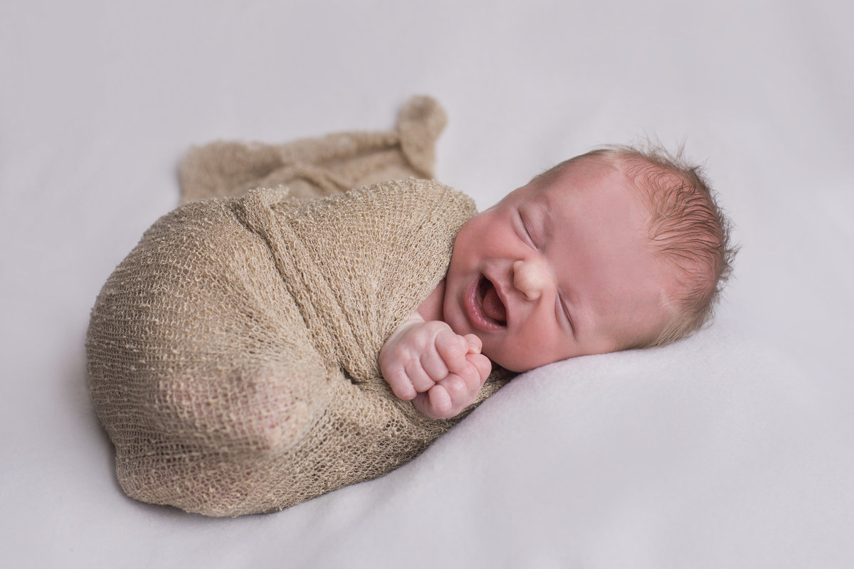 baby boy with huge smile