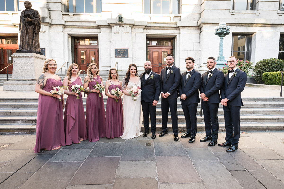 Wedding party in front of Supreme Court building in French Quarter