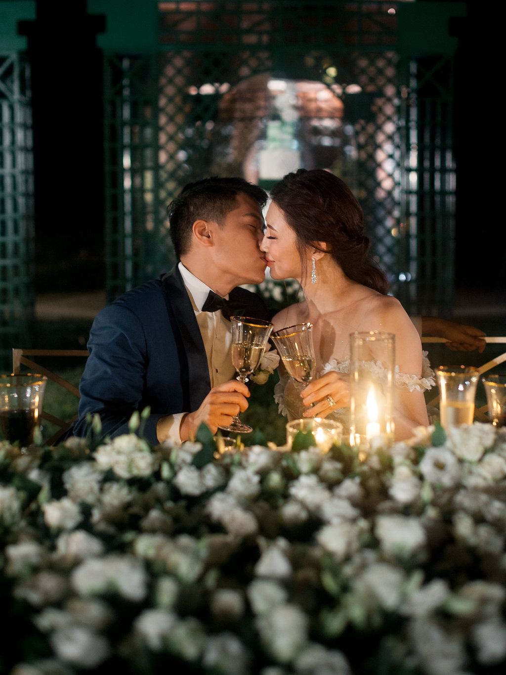 Wedding couple and floral centerpiece