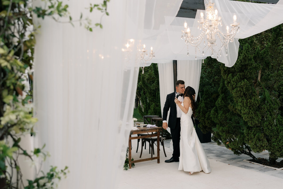 bride and groom candid at La Casa Toscana Wedding Venue Fort Myers Florida