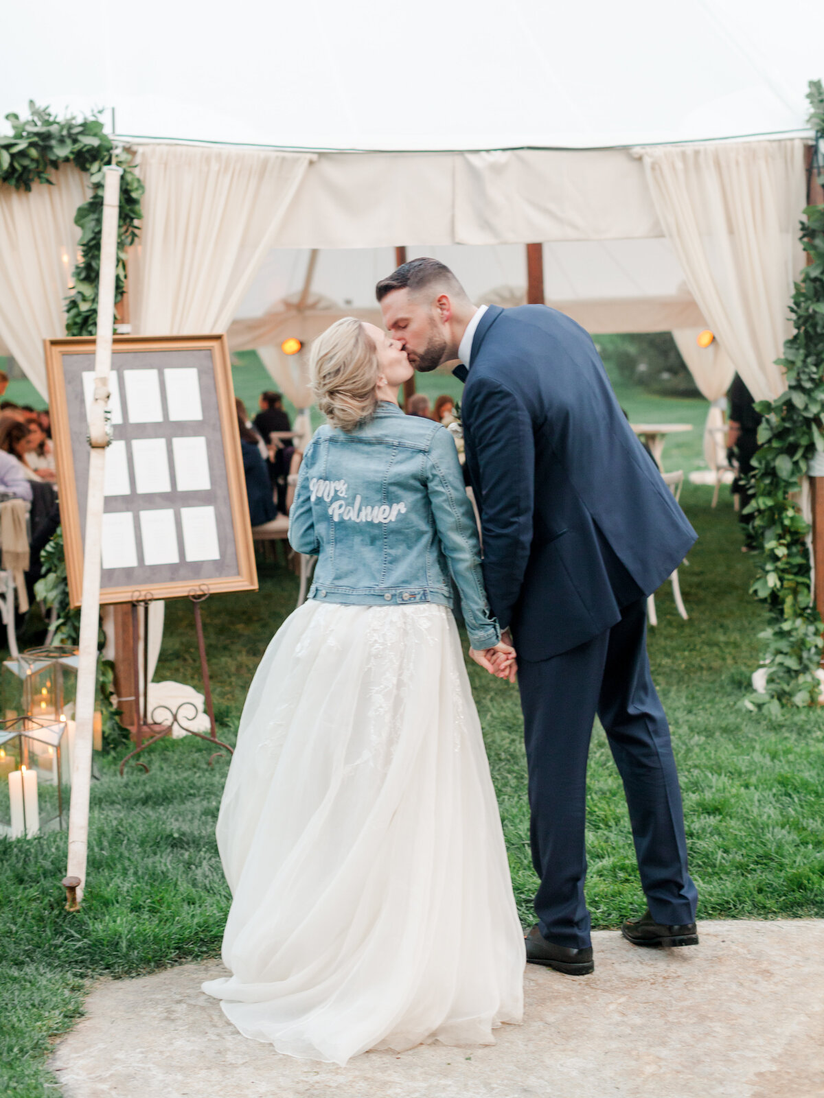 30-tented-wedding-bride-jean-jacket