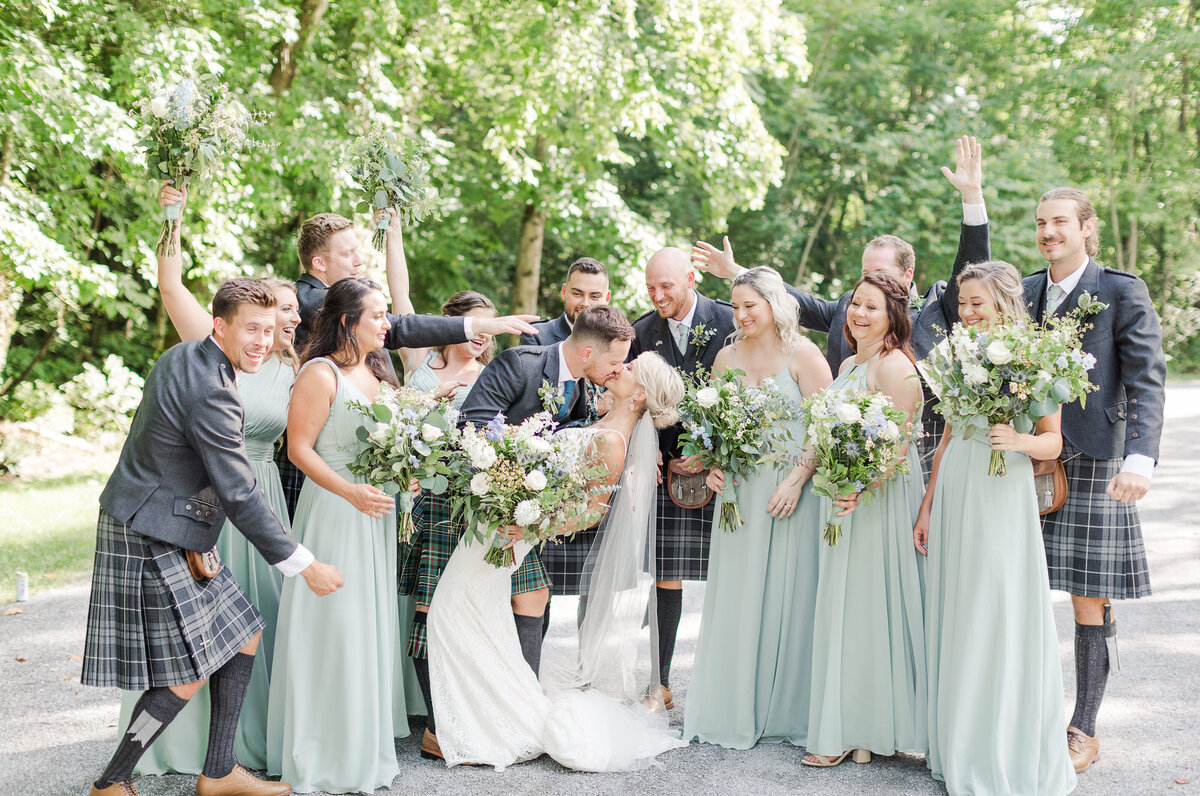 Bridal party at Scottish wedding celebrates, photography by Elizabeth Hill Photography