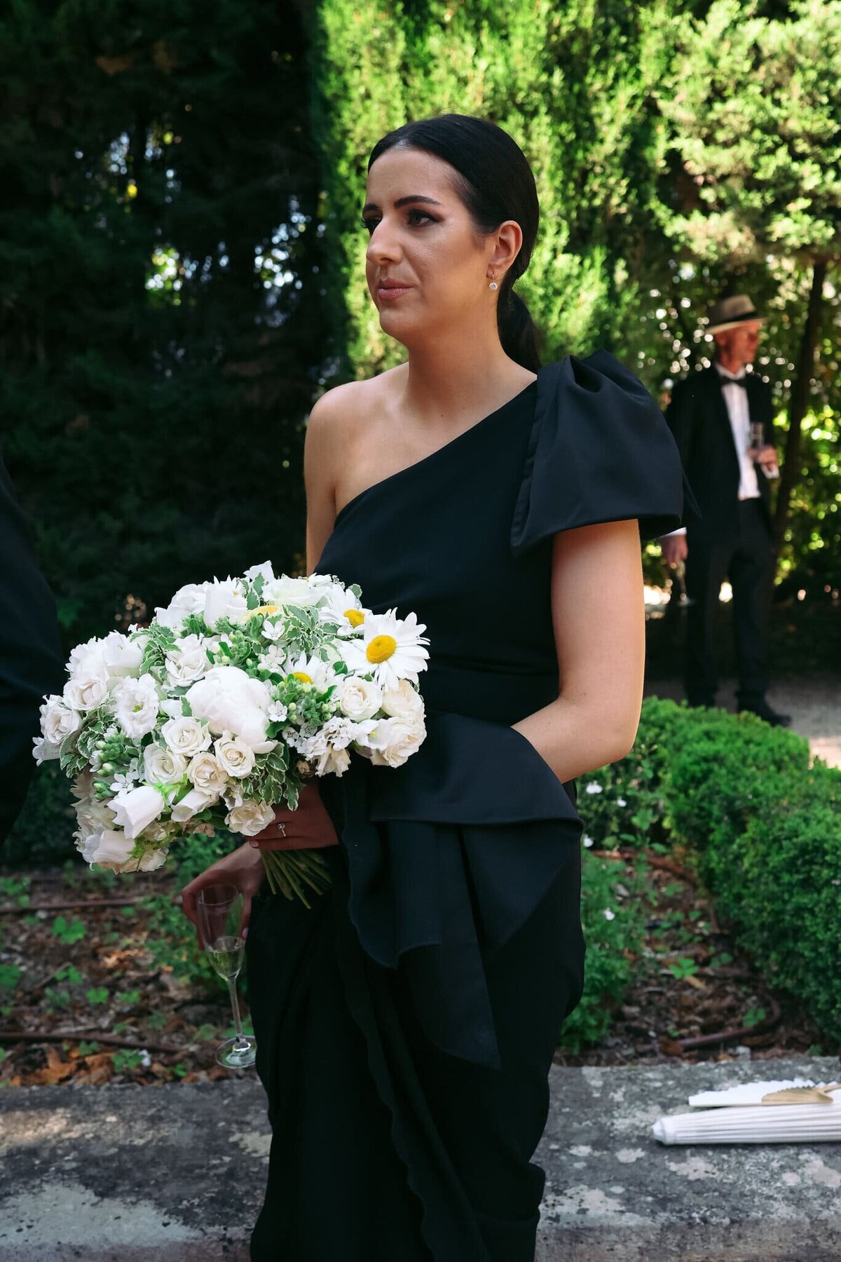 black-dress-and-white-bouquet