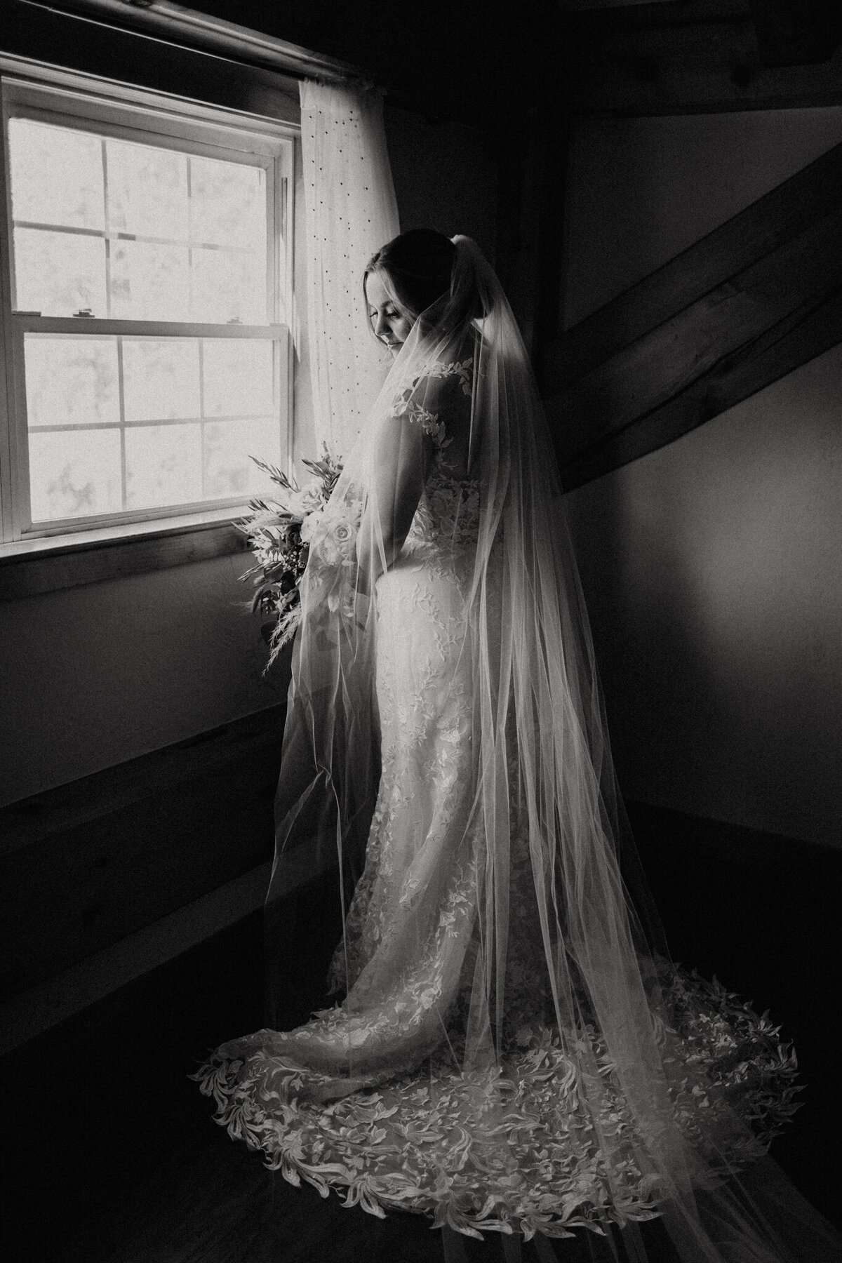 black and white image bride posing