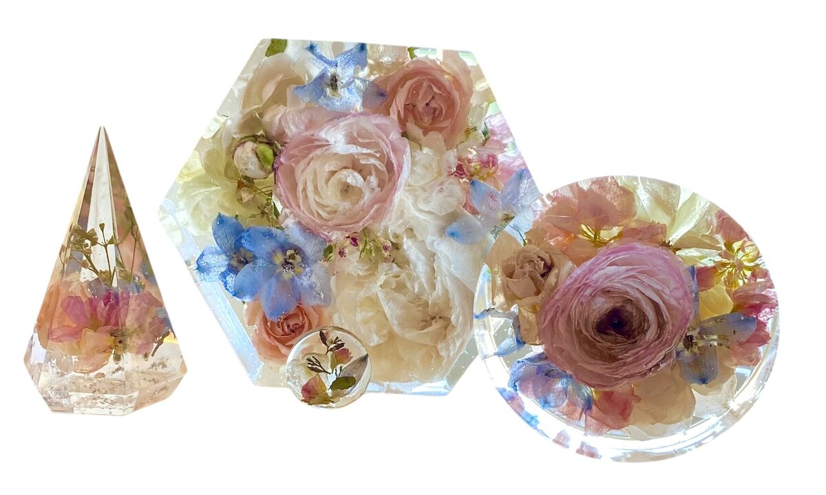 hexagon and circle resin blocks with bright pink and blue wedding flowers preserved as a family heirloom