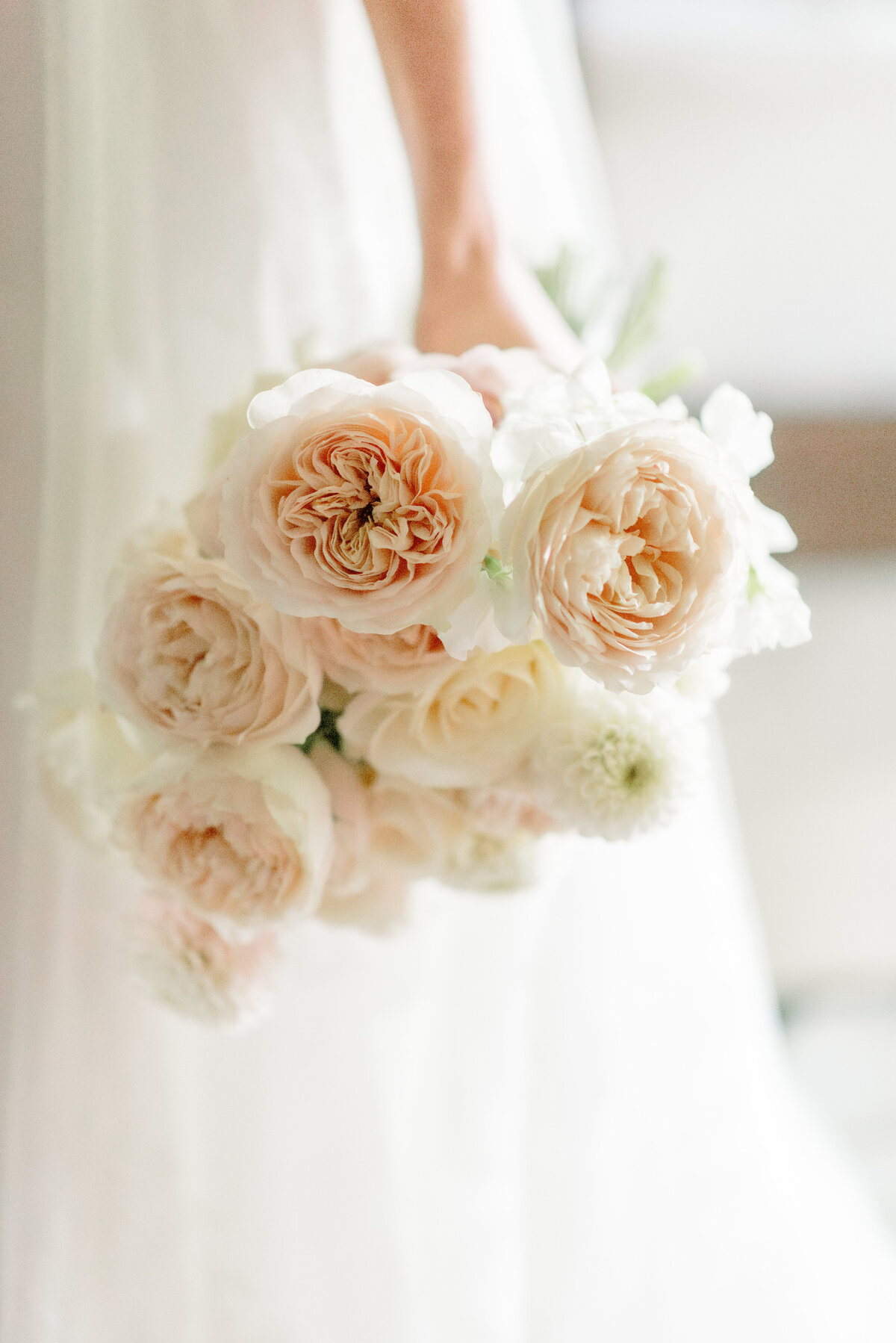 Pale coral and ivory wedding peony bouquet by Lavender and Rose Events for wedding in Cromlix House, Scotland.