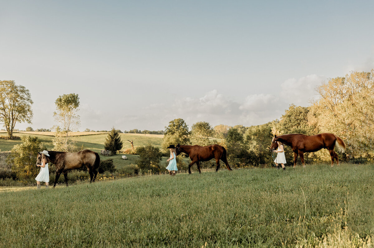 sisters with horses