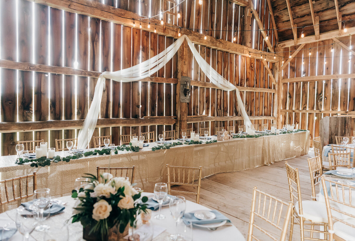 Glamorous barn wedding reception head table