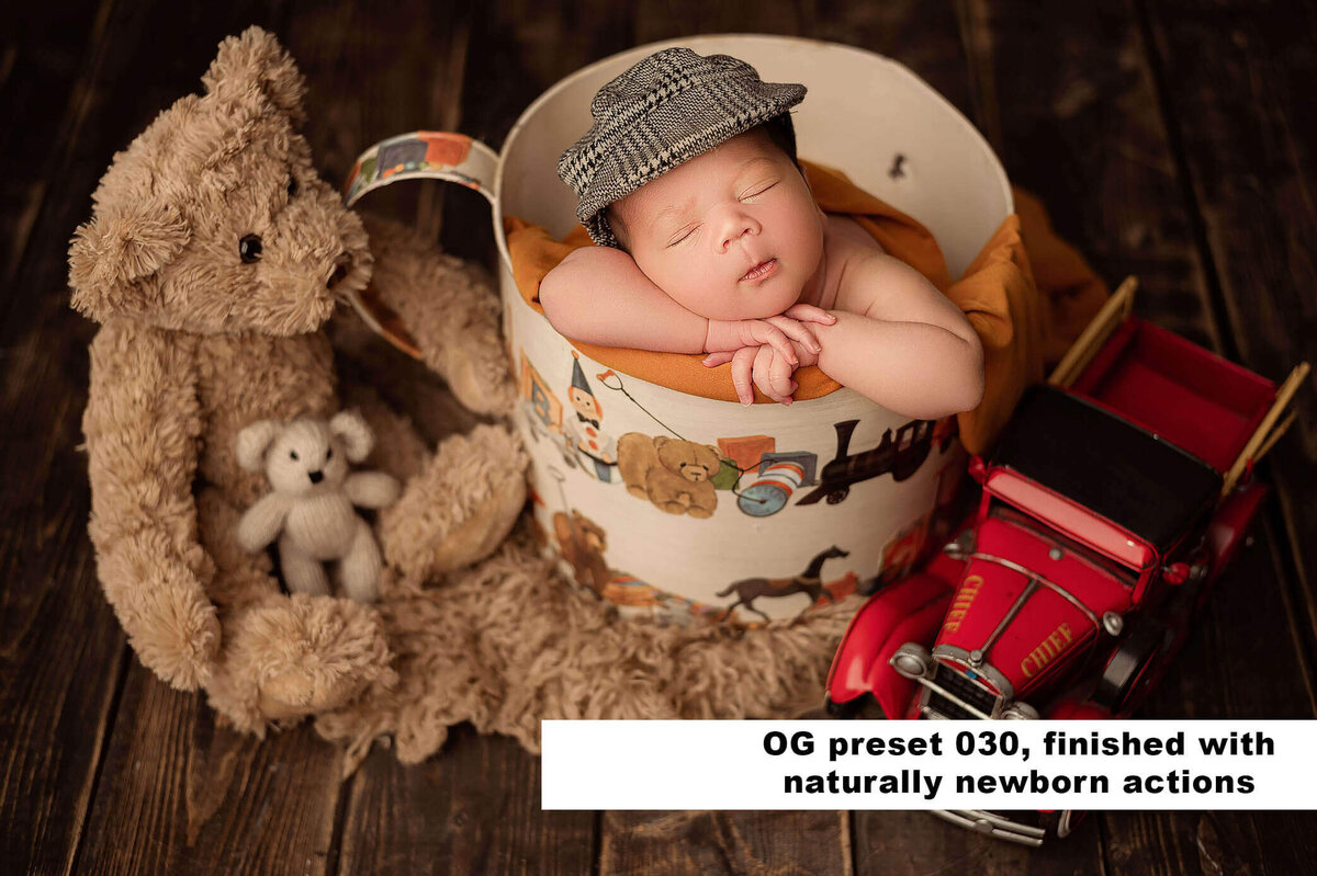 cute baby in bucket with truck and teddies