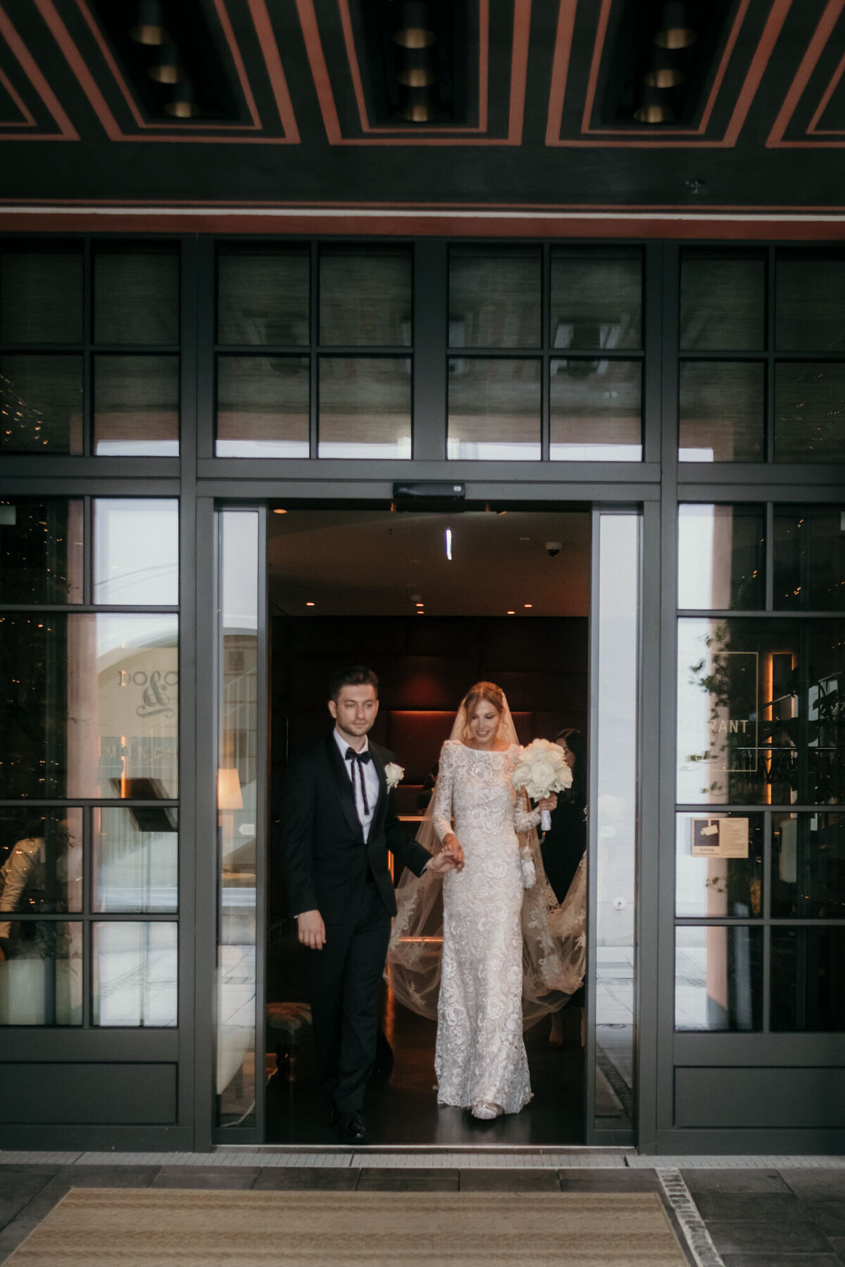 The wedding couple leaves the venue towards the church.