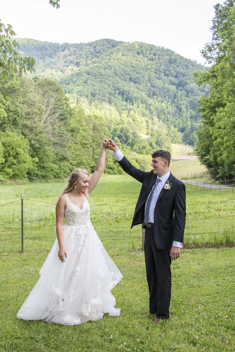 couple dancing with mountain view at Claxton Farm wedding
