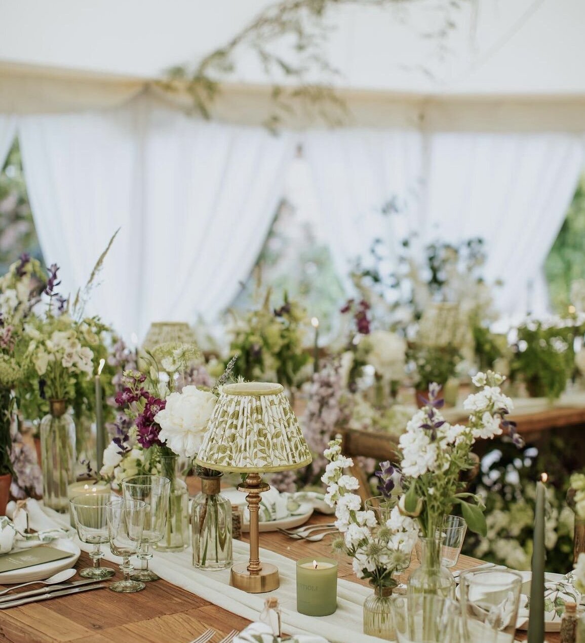 Editorial floral tablescape in neutral tones under garden tent, wedding reception inspiration for Airlie Gardens
