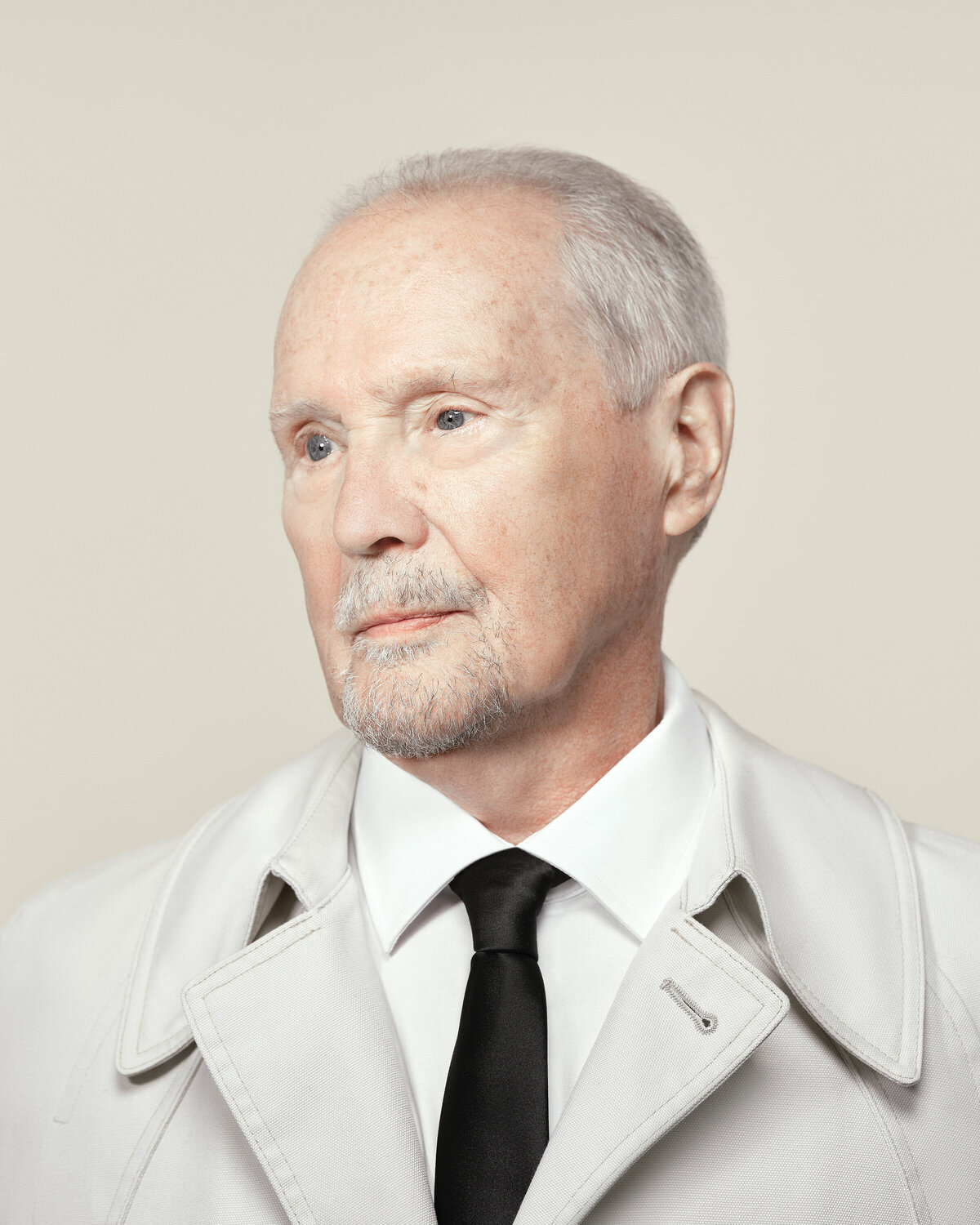 A man in a white coat