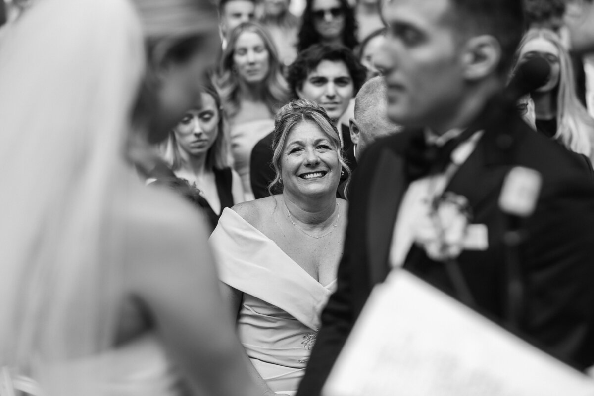 8-brides-mother-smiling-during-ceremony-upstate-new-york-wedding