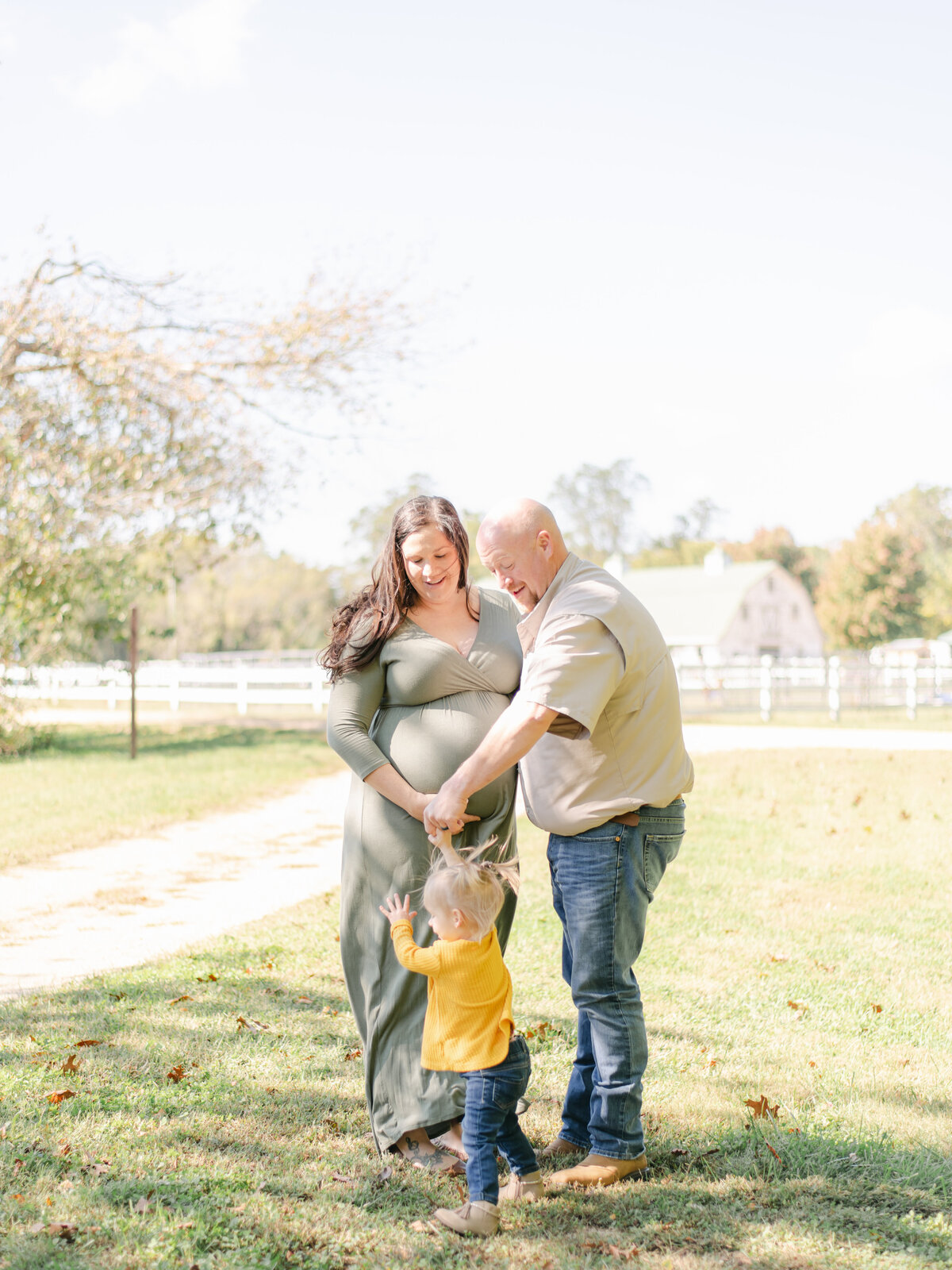 Young growing family during maternity session.