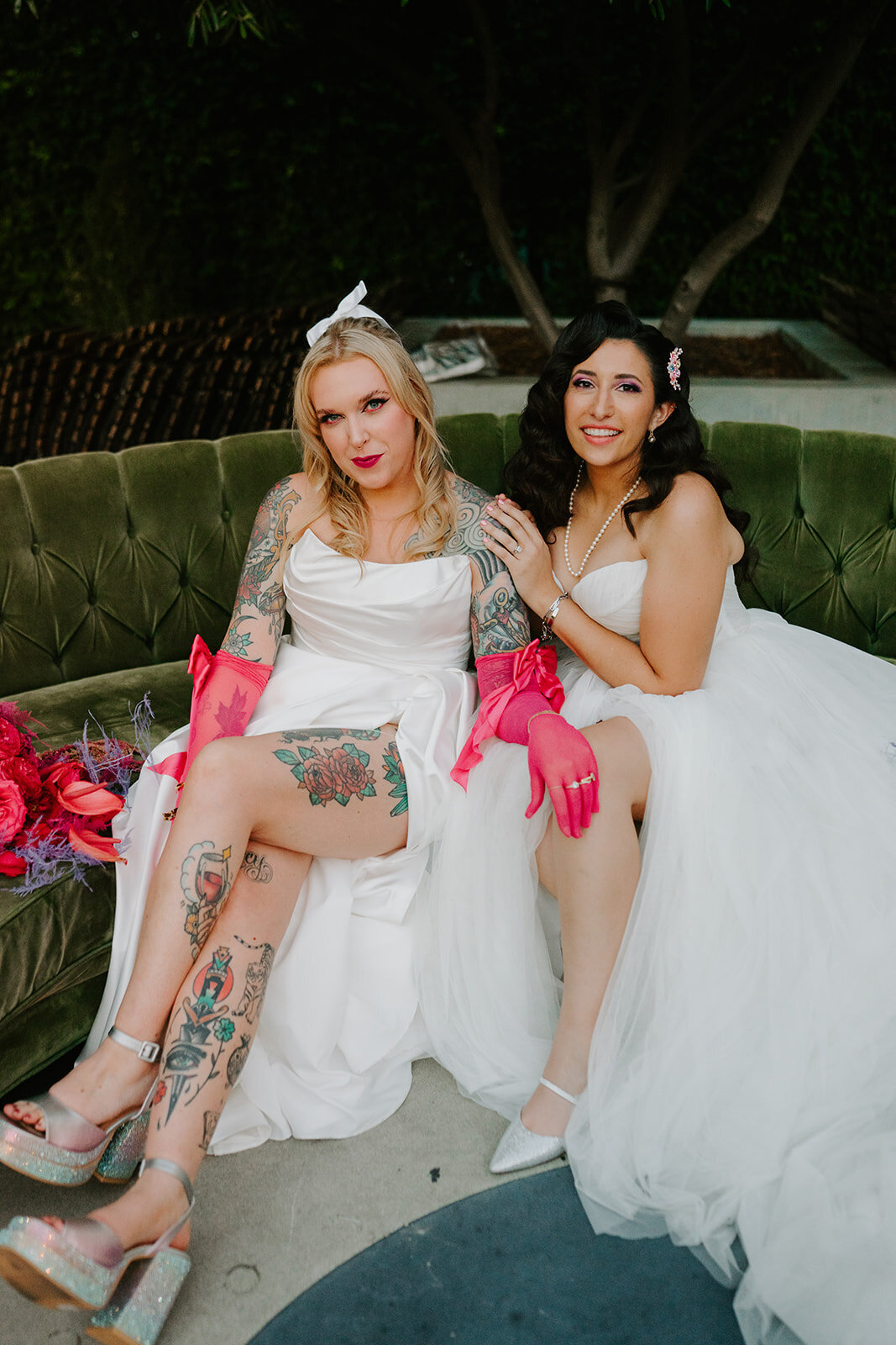 queer wedding couple at the Fig House with bright pink gloves and tattoos