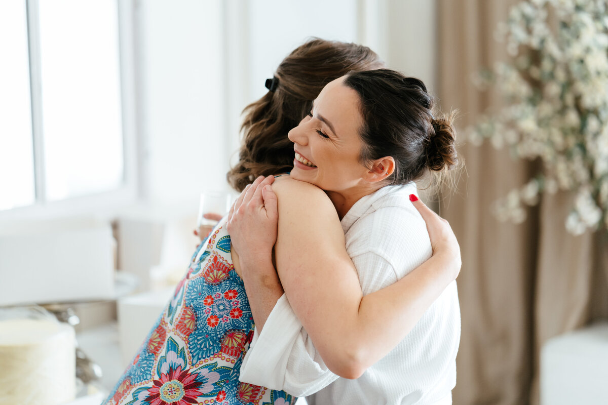 Bride-Hugging-Guest
