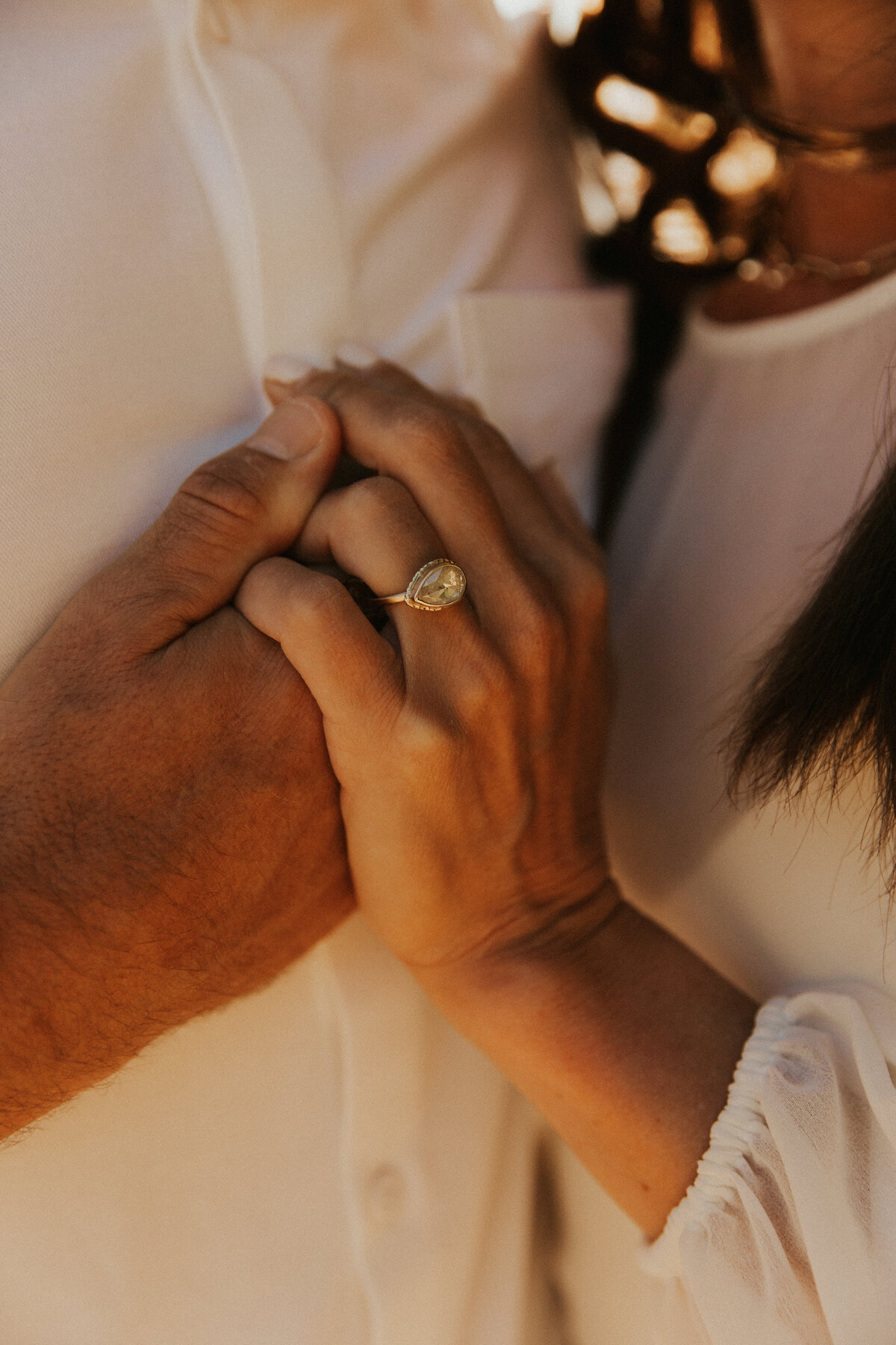 Hawaii Engagement Photographer captures close up of engagement ring during beach engagement photos