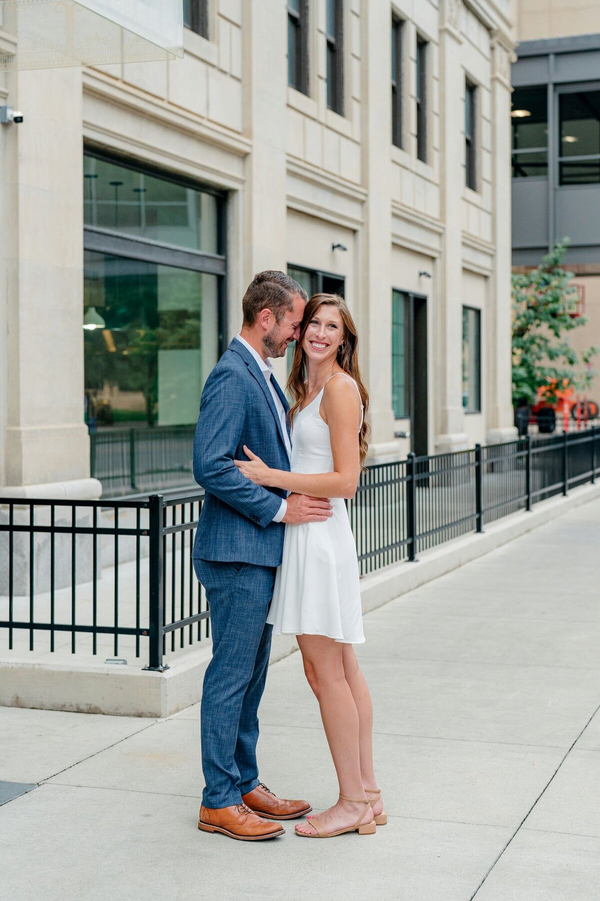 couple-posed-city-engagement