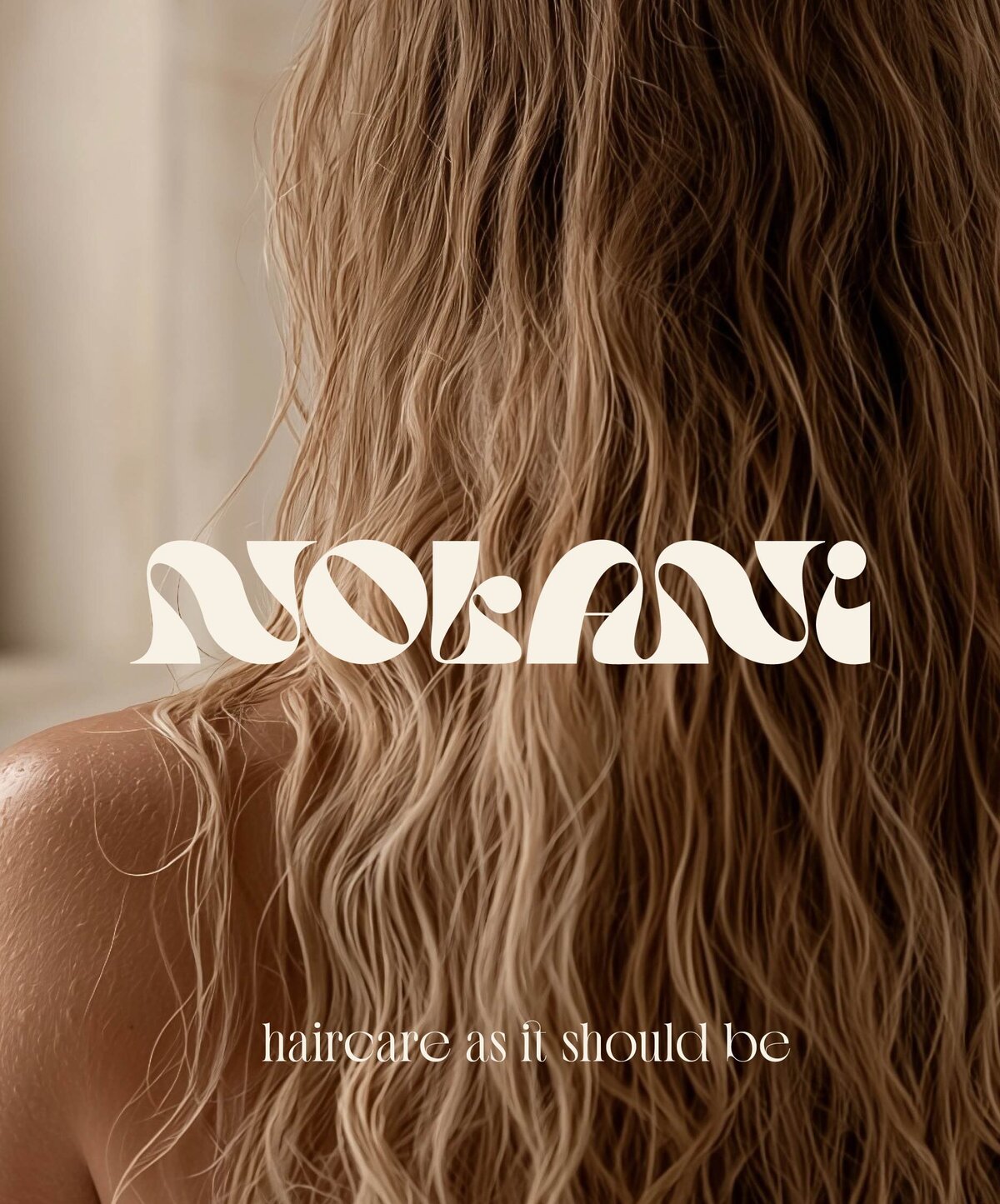 back of woman with blonde wavy hair-nolani logo