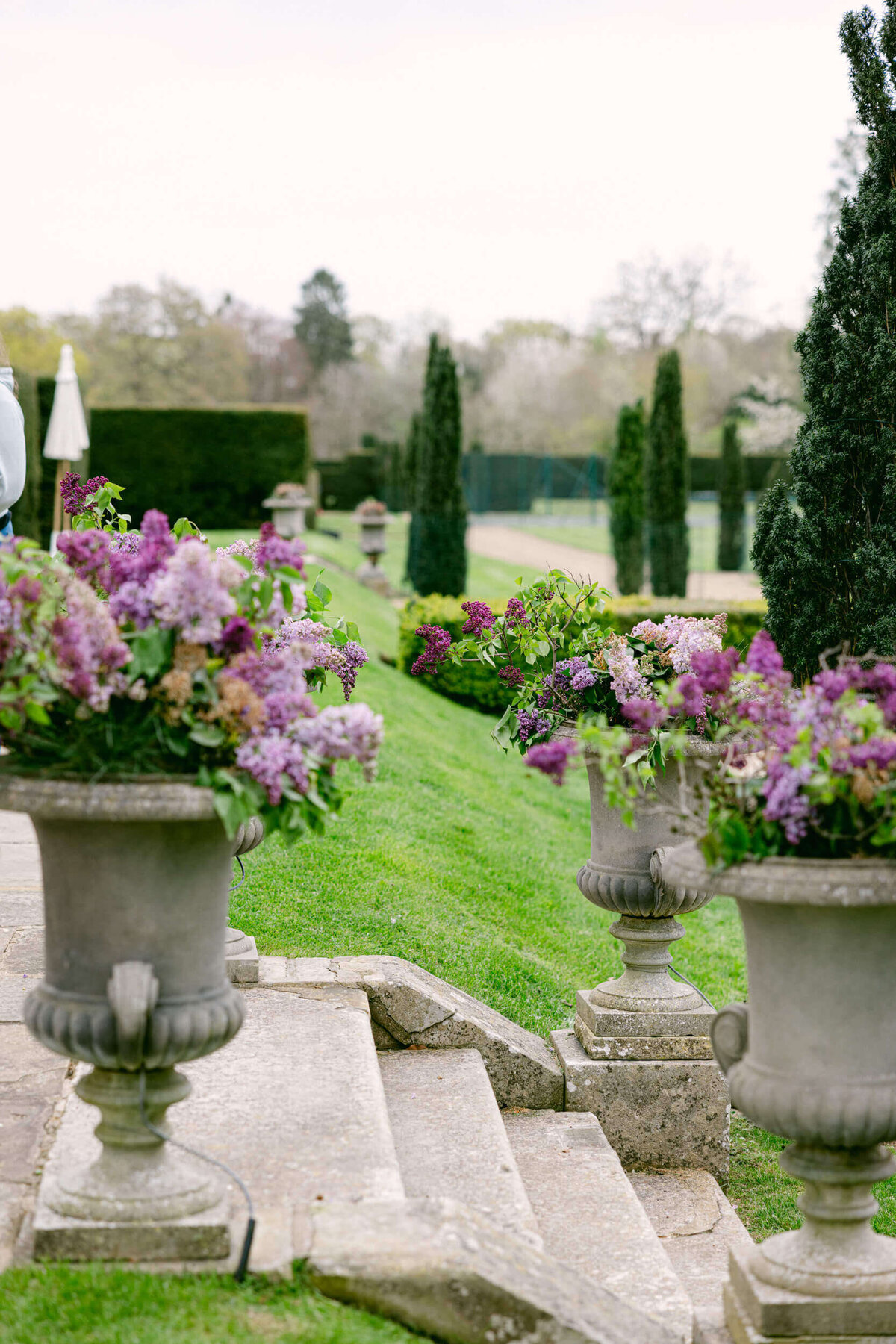 A wedding photo of flower pots at Hedsor House in the UK