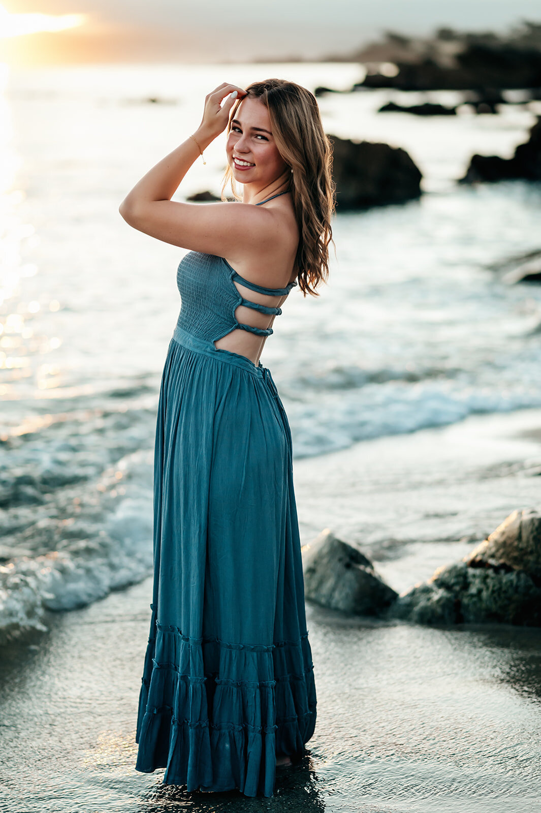 Senior portrait at sunrise, Lovers Point Beach — view senior photo gallery