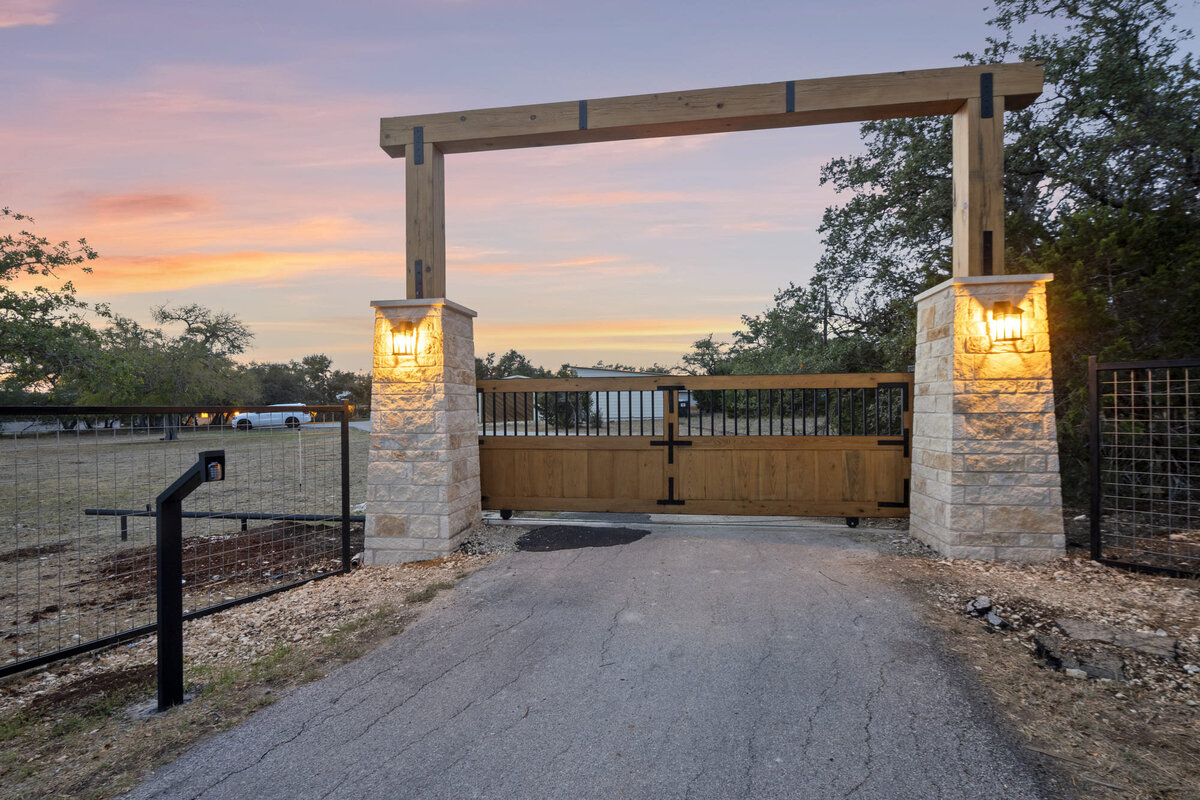 Gated drive way to large rental home in Wimberley