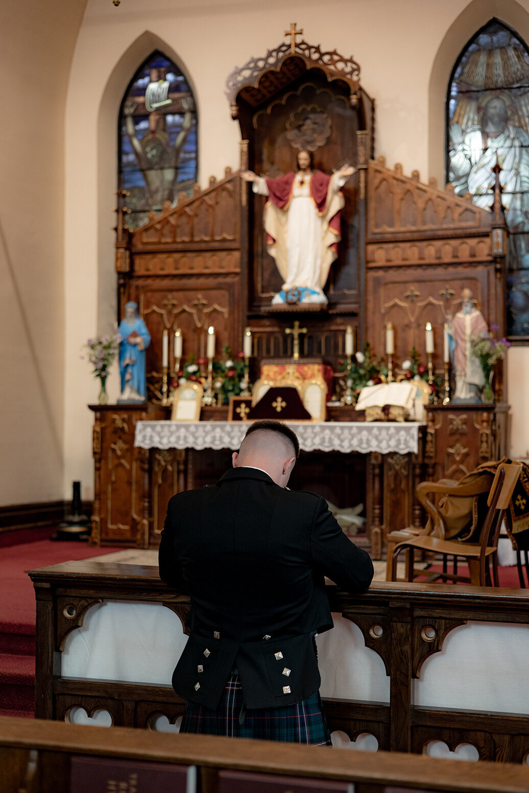 groom-praying-before-wedding-mass-tlm