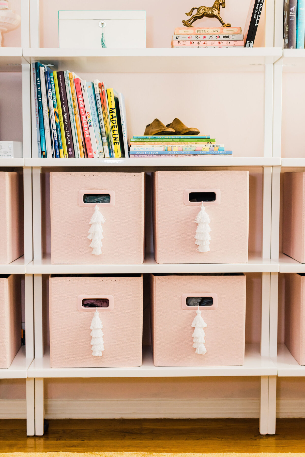 Nursery bookshelves with bins