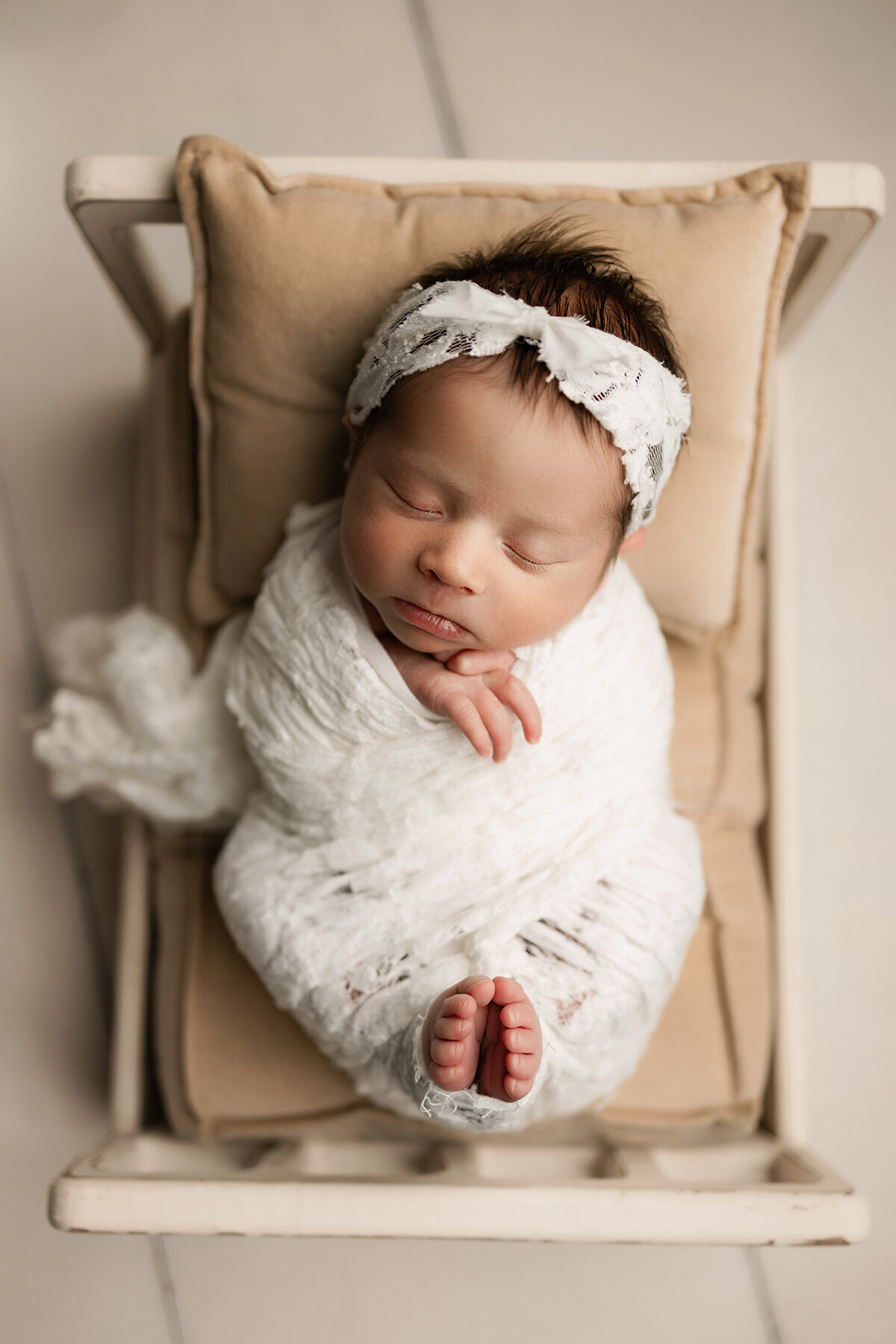 Wrapped up baby girl in Denver Colorado downtown studio