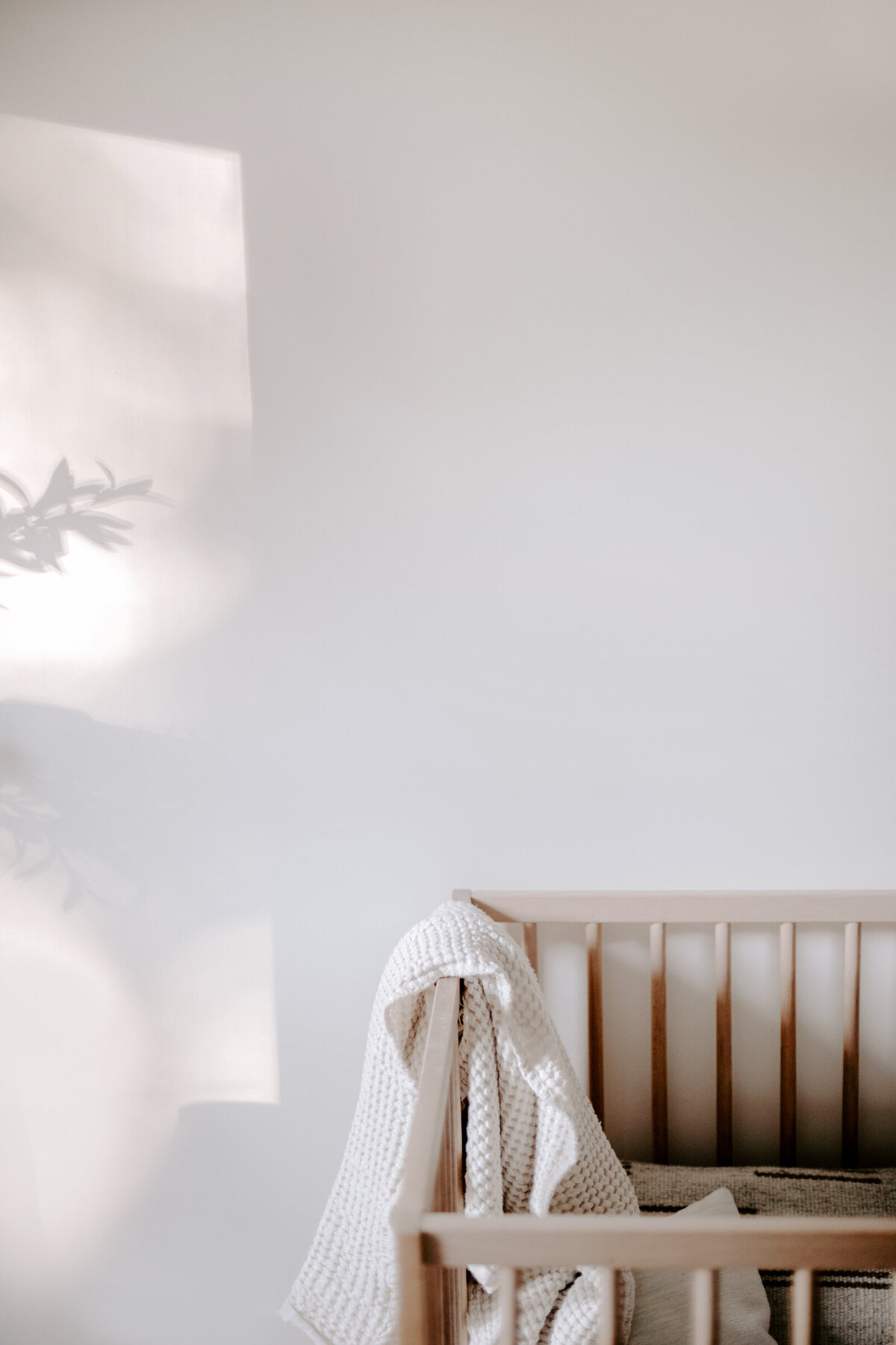 Wood crib against wall