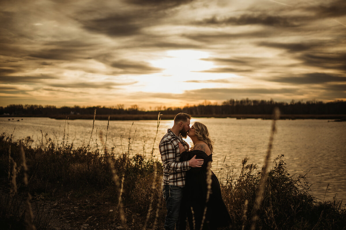 water sunset engagement session