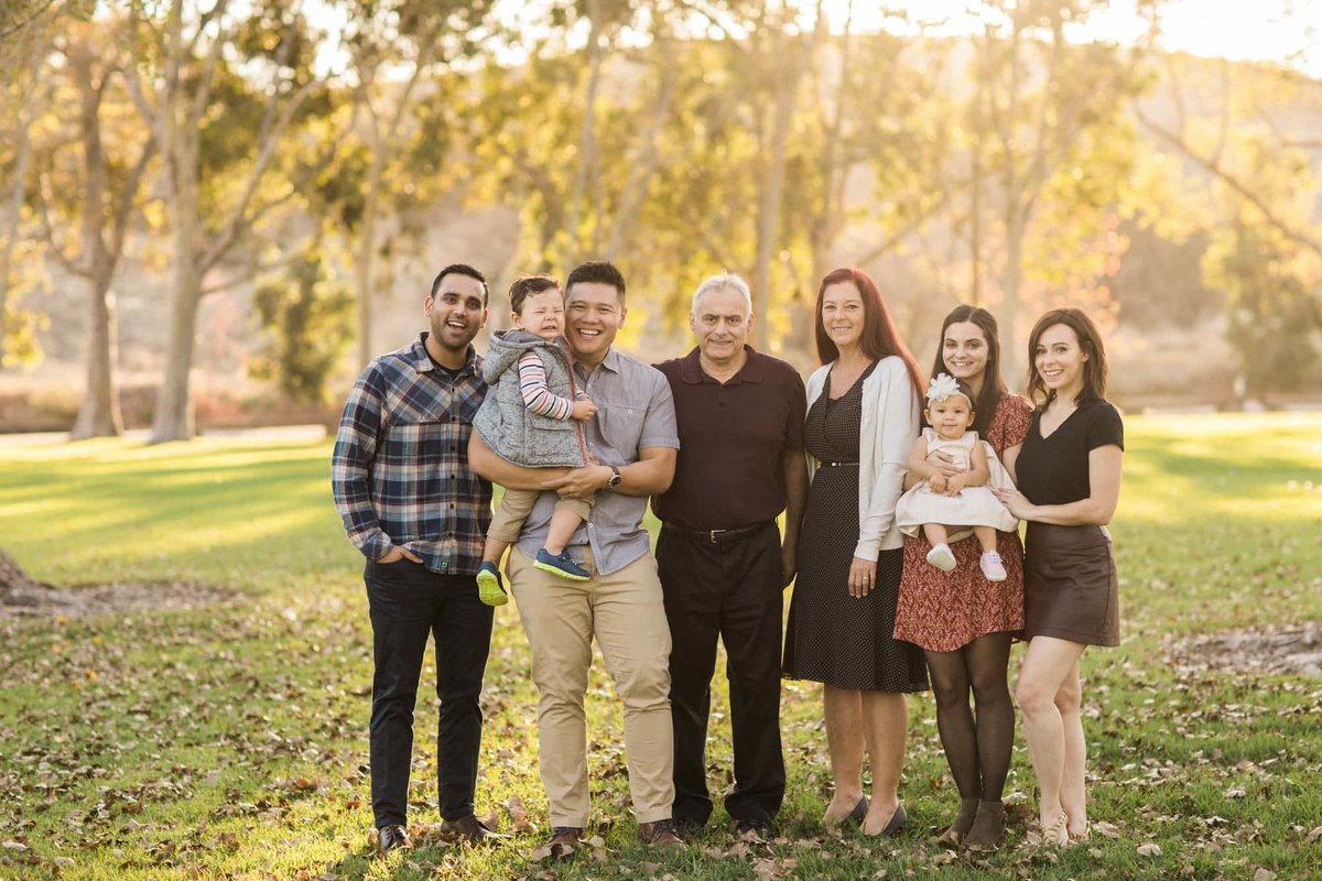 Family of different generations come together at a park for a family photography session