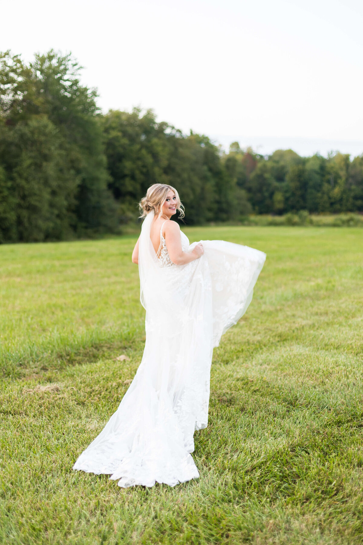 Bride in the grounds of  The Barn at White Oaks, Murray, Kentucky