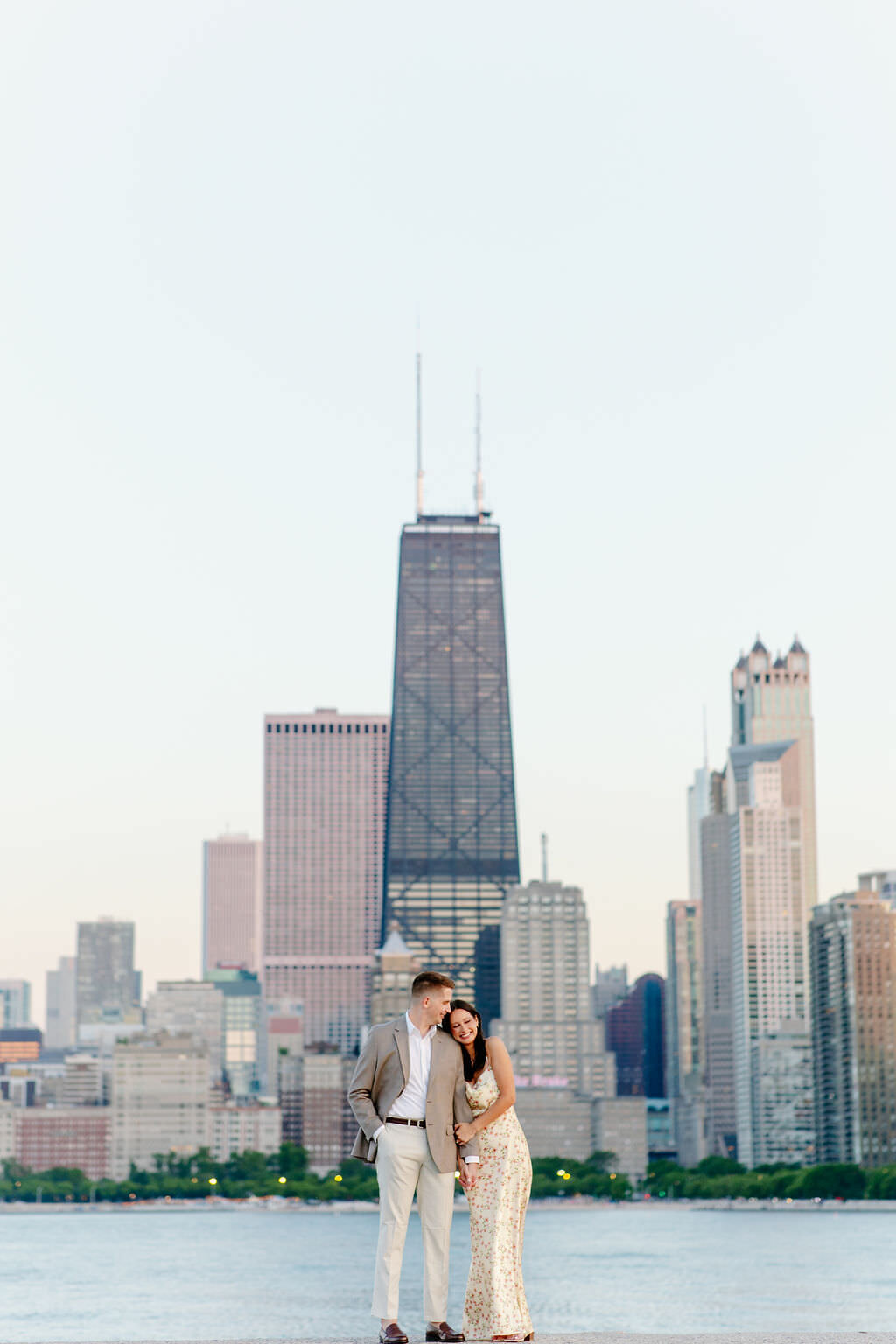 An engagement photography session at The Wrigley Building and North Ave Beach in Chicago, Illinois - 26