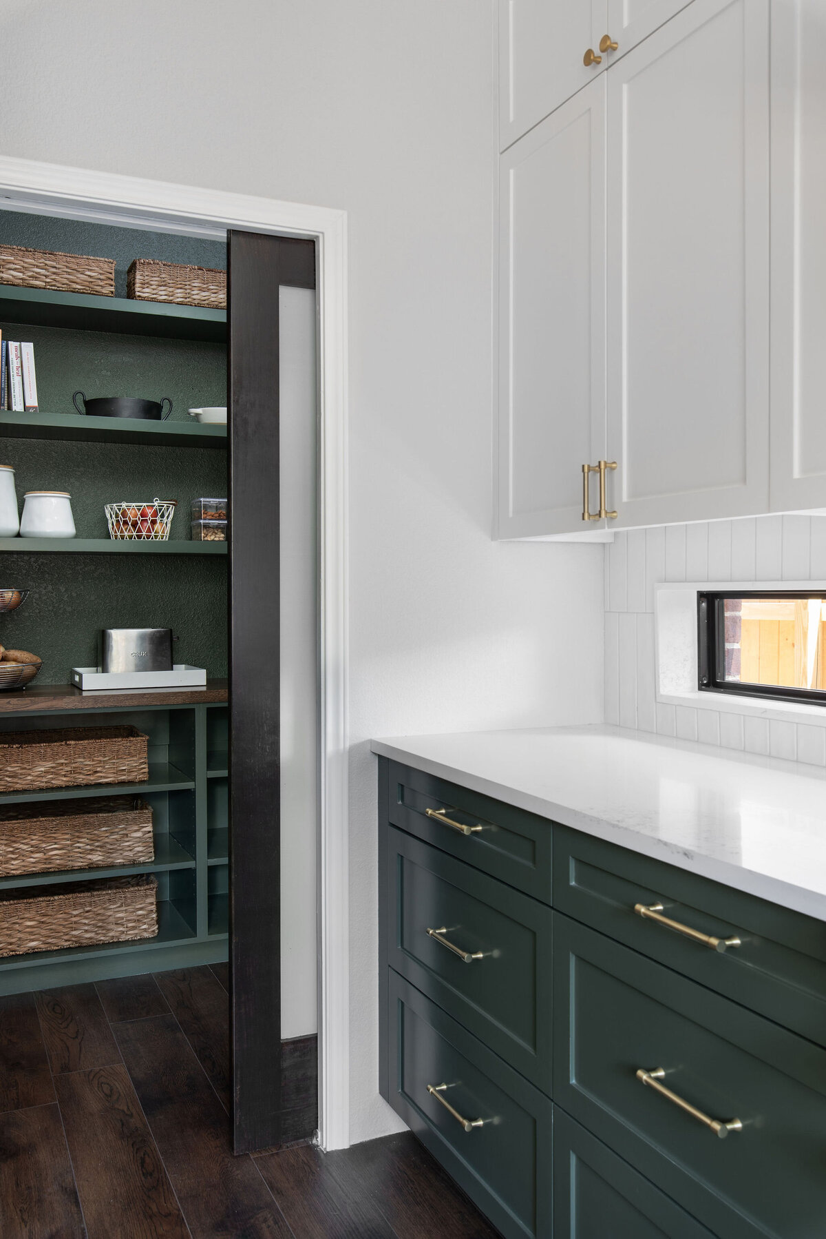 hello-home-austin-butler-pantry-two-tone-kitchen-remodel-countertop-window-green-cabinets-tile-to-ceiling-10